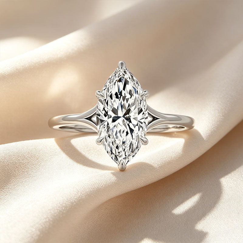 Marquisegeslepen zespoots ring