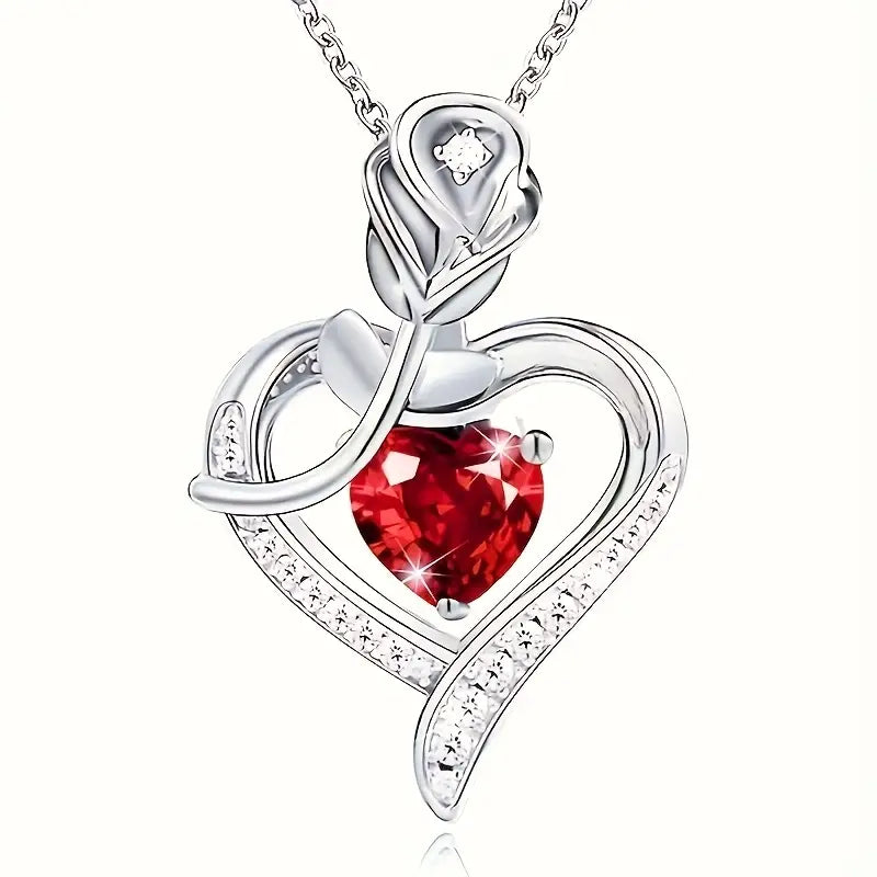 Zilveren harthangerketting met robijn