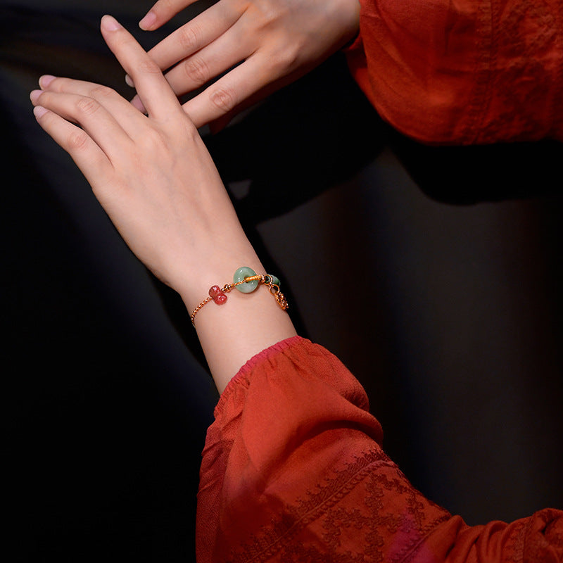 Natuurlijke lotus vlinder steenarmband met smaragd en jade