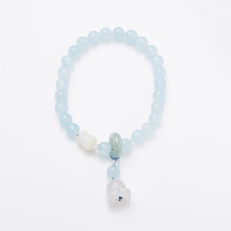 Natuurlijke lelietje-van-dalen pompoen steenarmband met smaragd en jade