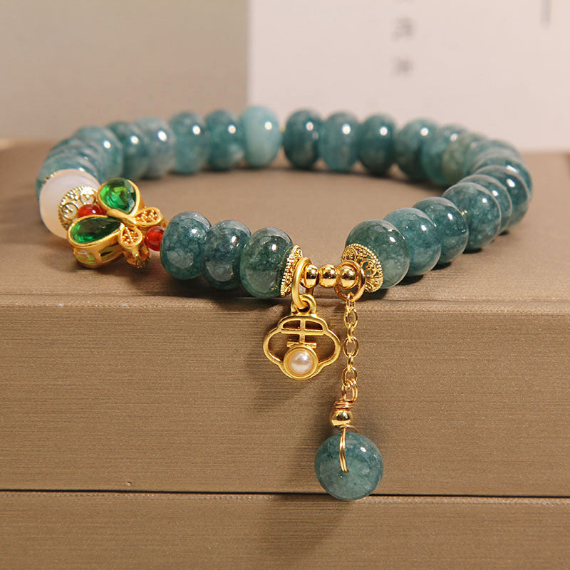 Natuurlijke vlinder steenarmband met smaragd en jade
