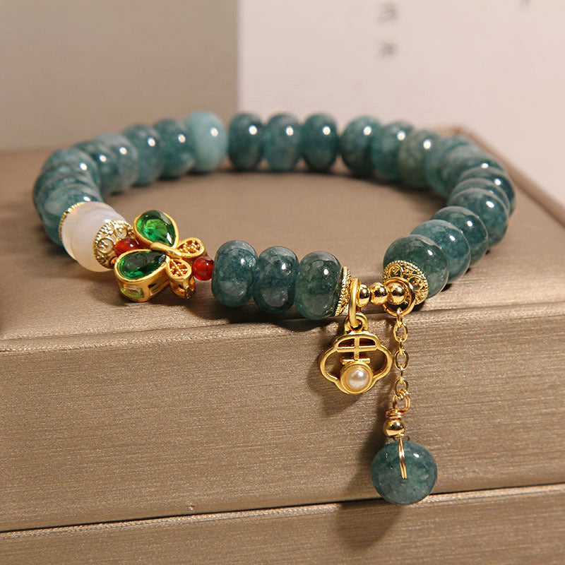 Natuurlijke vlinder steenarmband met smaragd en jade
