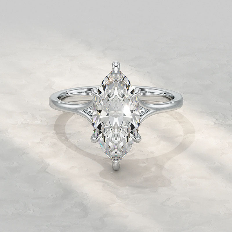 Marquisegeslepen zespoots ring
