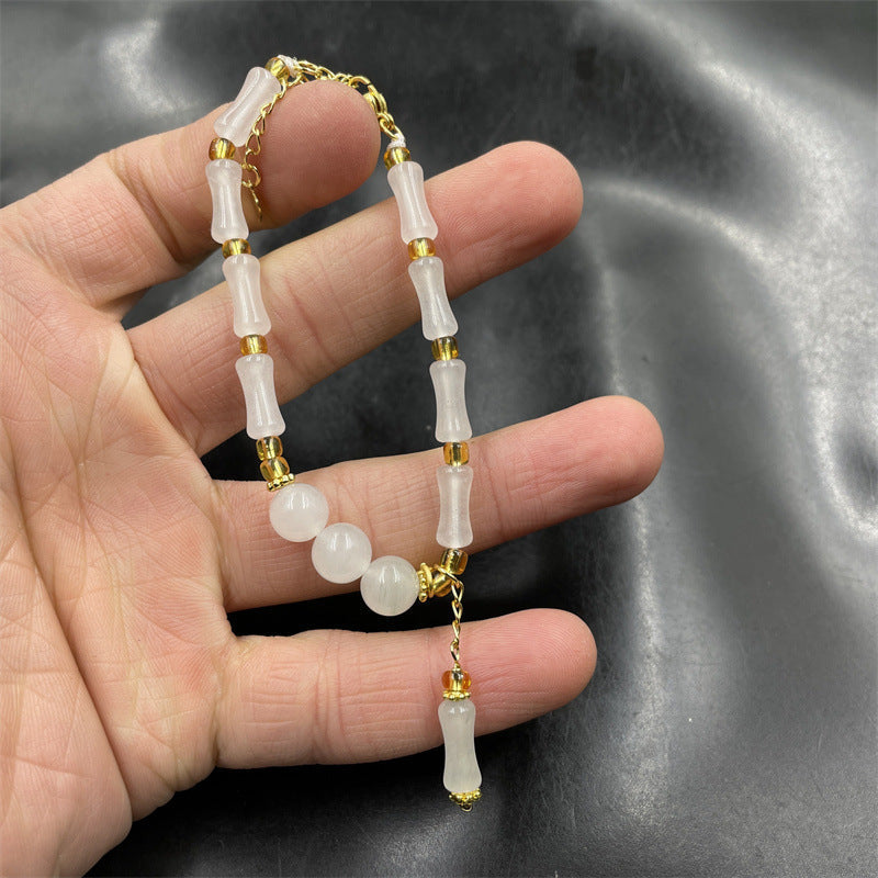 Witte natuurlijke bamboe steenarmband met jade en smaragd