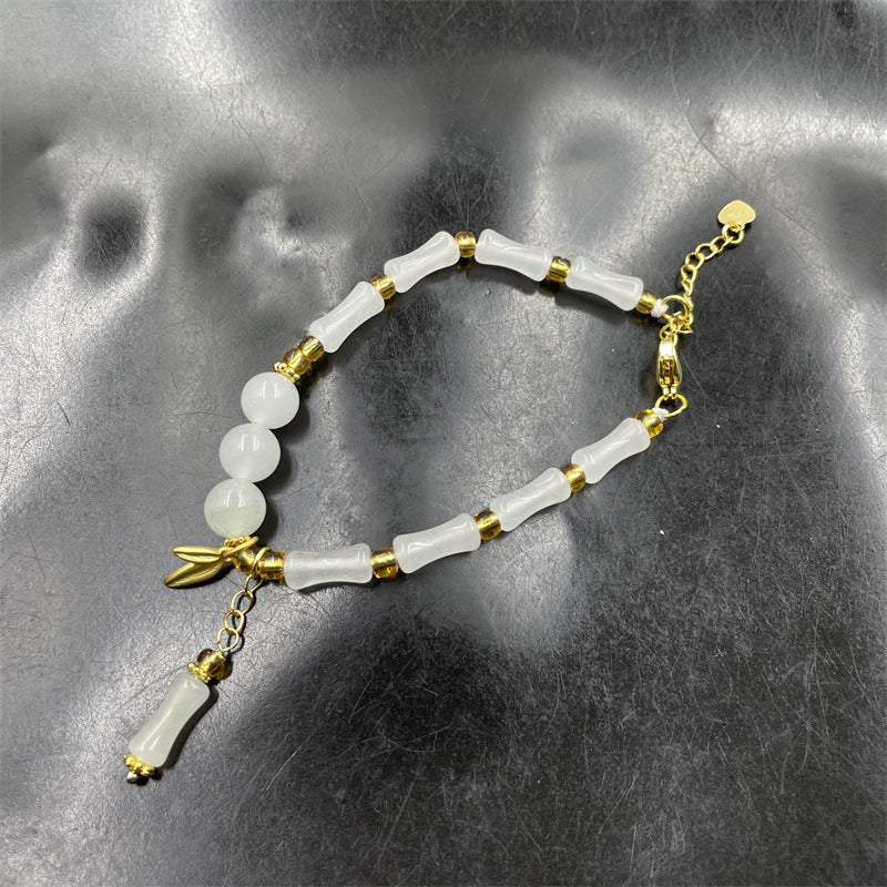 Witte natuurlijke bamboe steenarmband met jade en smaragd