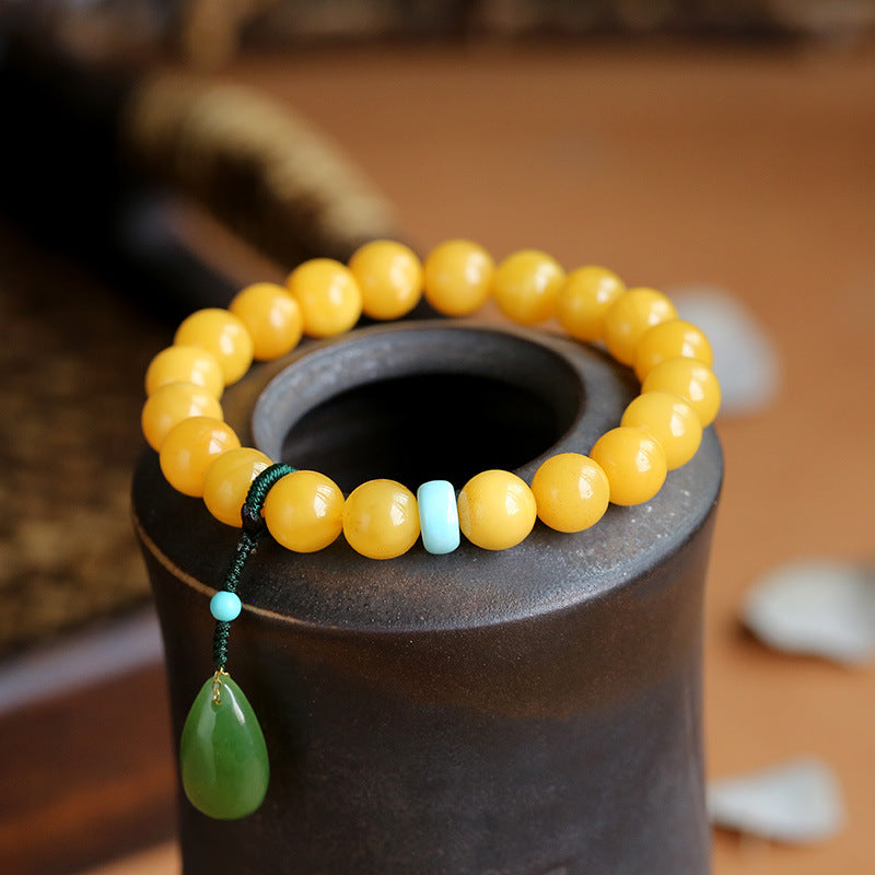Natuurlijke hangerarmband met jade en bijenwas