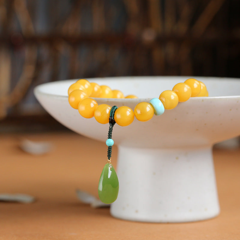 Natuurlijke hangerarmband met jade en bijenwas