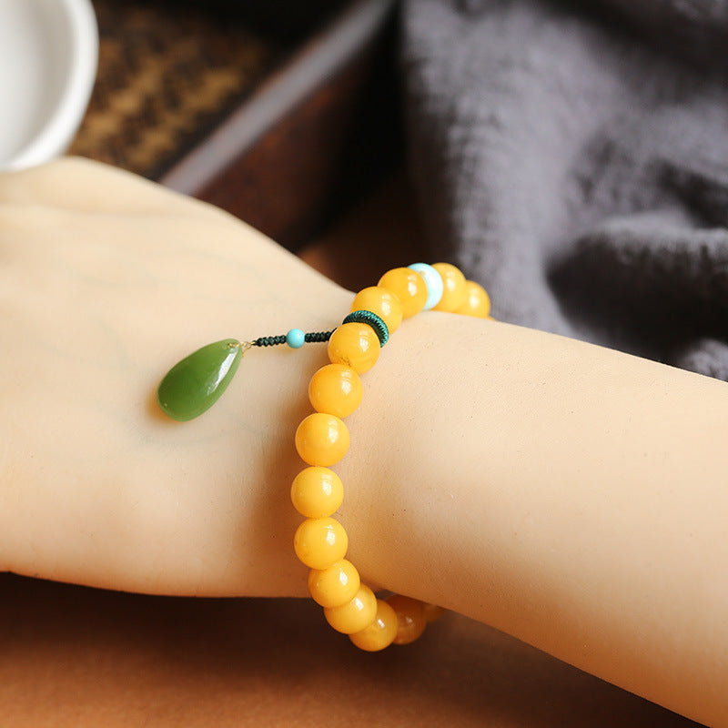 Natuurlijke hangerarmband met jade en bijenwas
