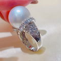 Witte diamantring met parel