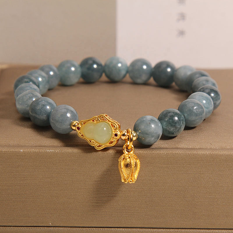 Natuurlijke lelietje-van-dalen kalebas steenarmband met smaragd en jade