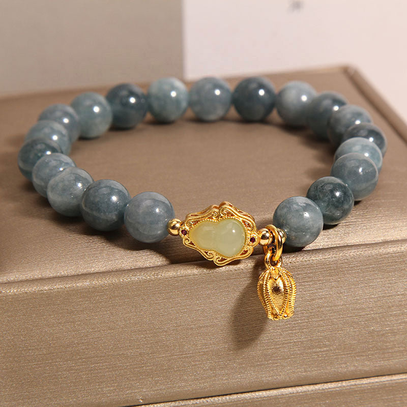 Natuurlijke lelietje-van-dalen kalebas steenarmband met smaragd en jade