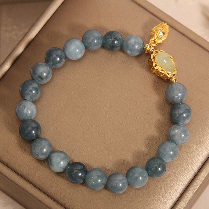 Natuurlijke lelietje-van-dalen kalebas steenarmband met smaragd en jade