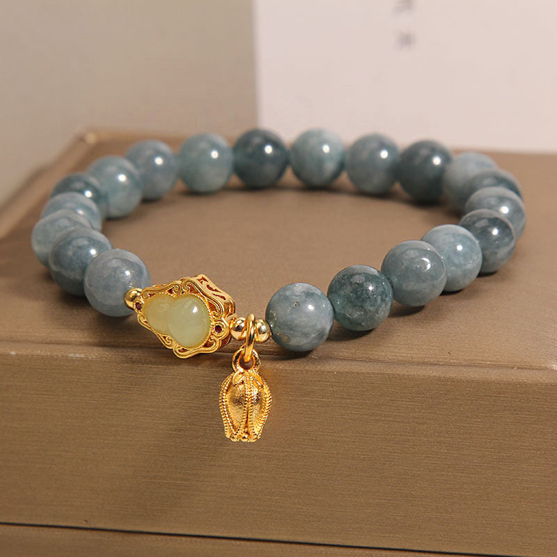 Natuurlijke lelietje-van-dalen kalebas steenarmband met smaragd en jade