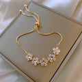 Gouden madeliefarmband met kristal