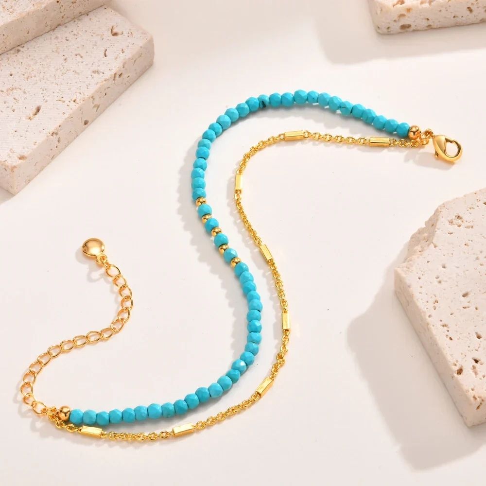 Tijdloze dubbele gouden kettingarmband met turkoois