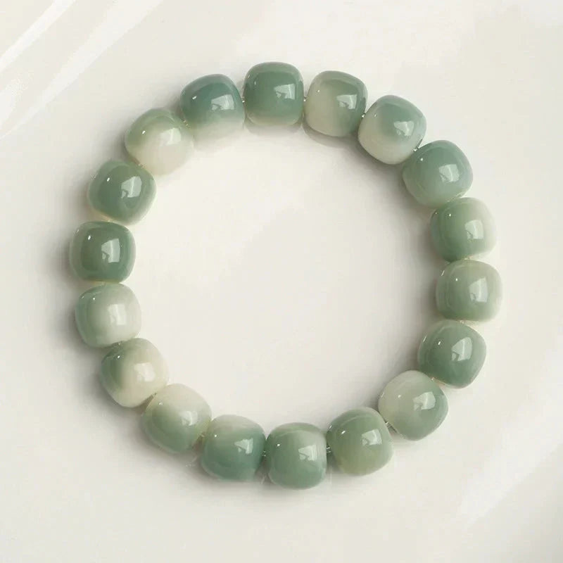 Witte bodhi-armband met jade