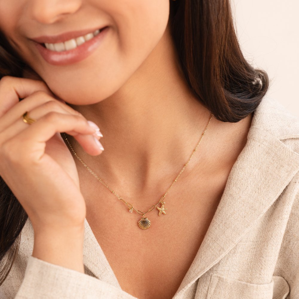 Gouden schelp zeesterketting