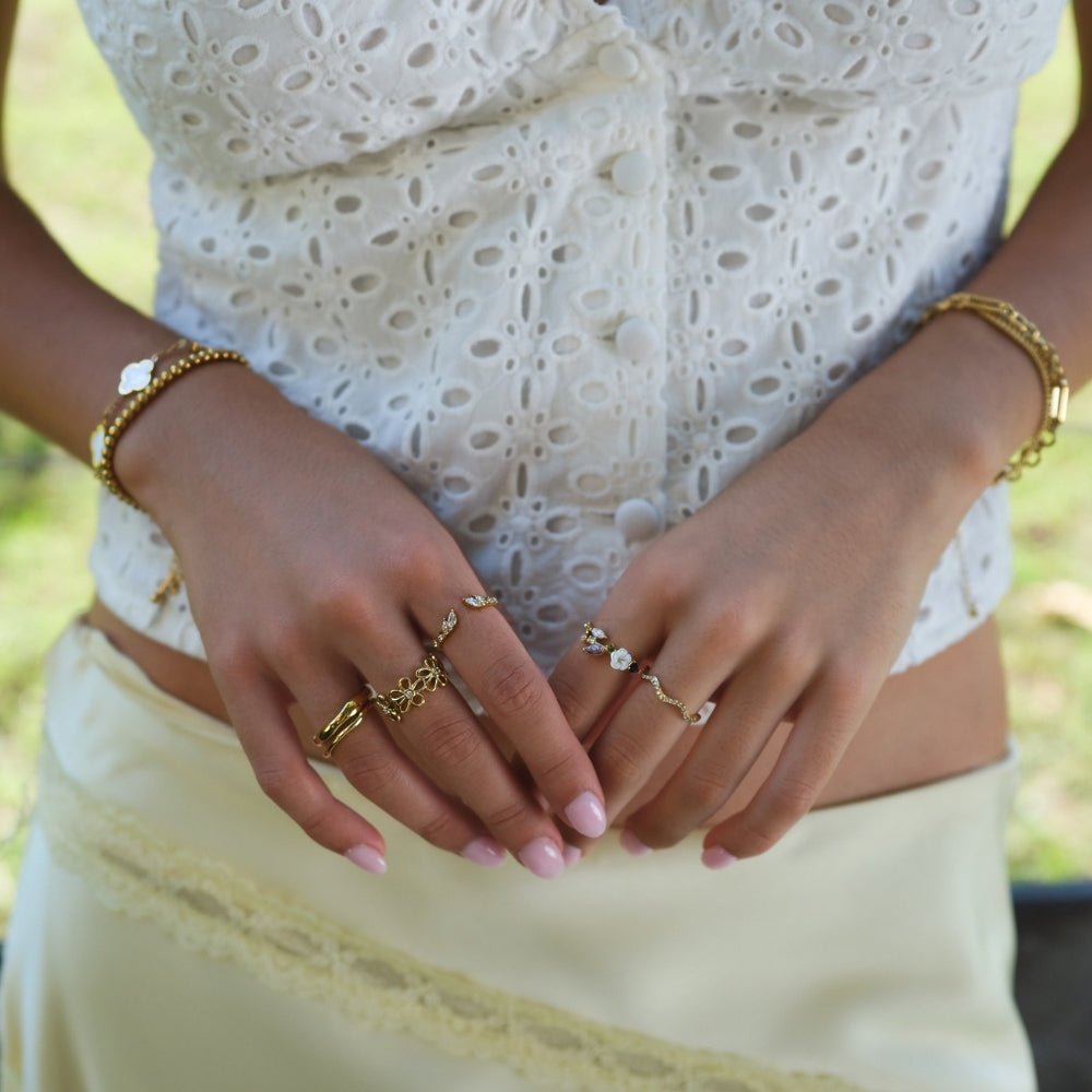 Gouden veldbloem infinityring