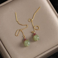Vintage olijfoorbellen met parel