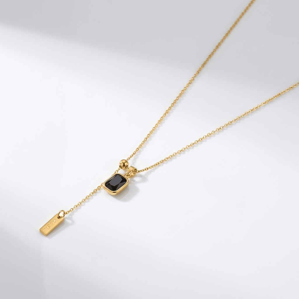Vintage lariatketting met smaragd