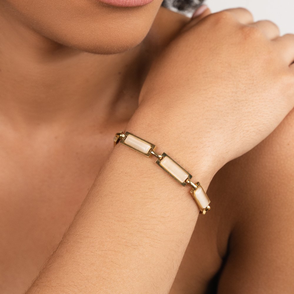 Gouden opaalarmband met baguette