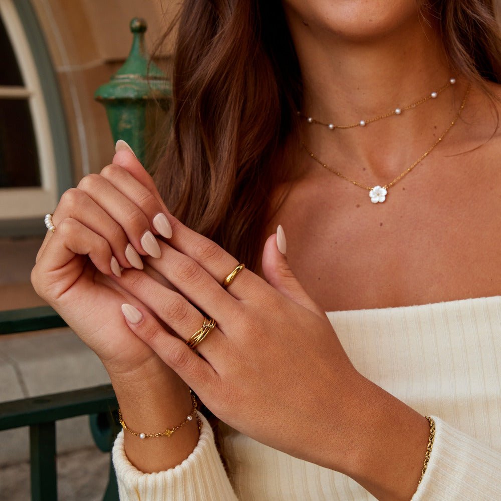Mia gedraaide gouden ring